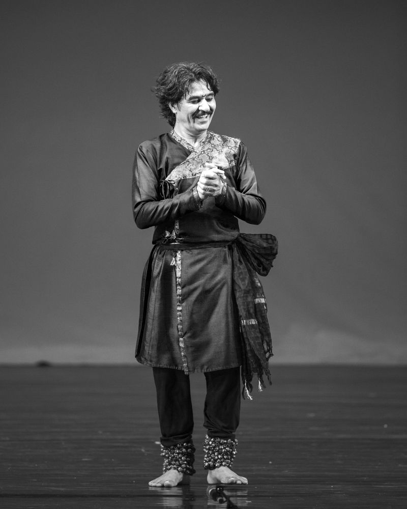 A black costume dancer