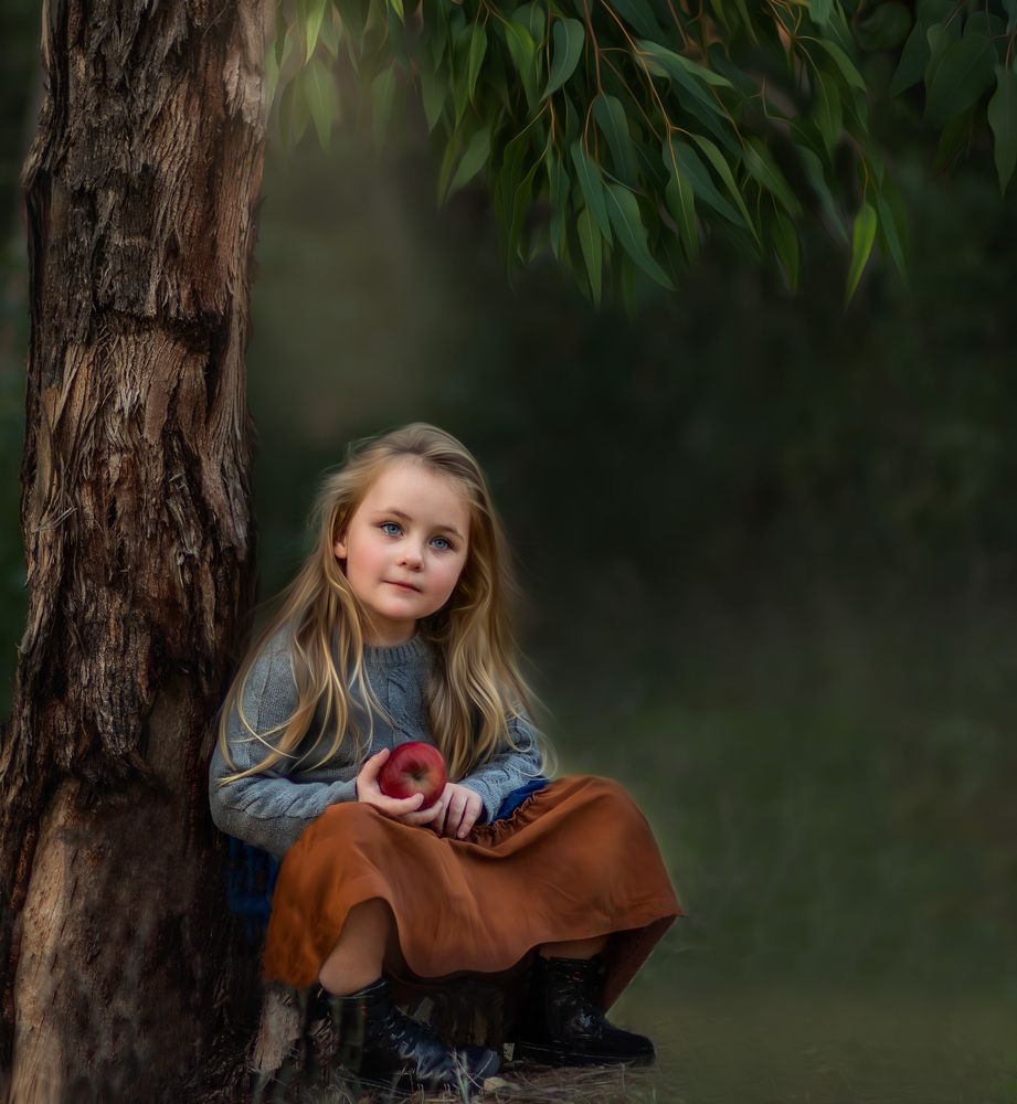 A little girl in the magic forest