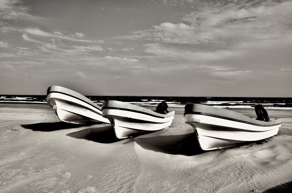 Boats in the sand