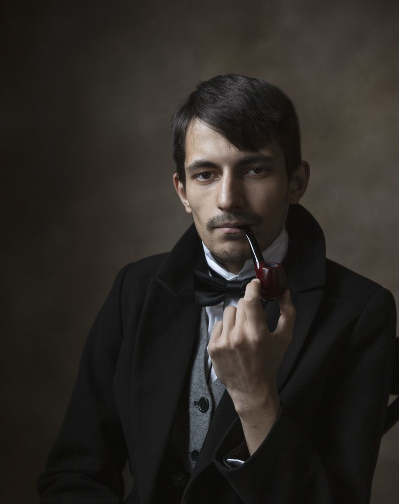 A man with a smoking pipe