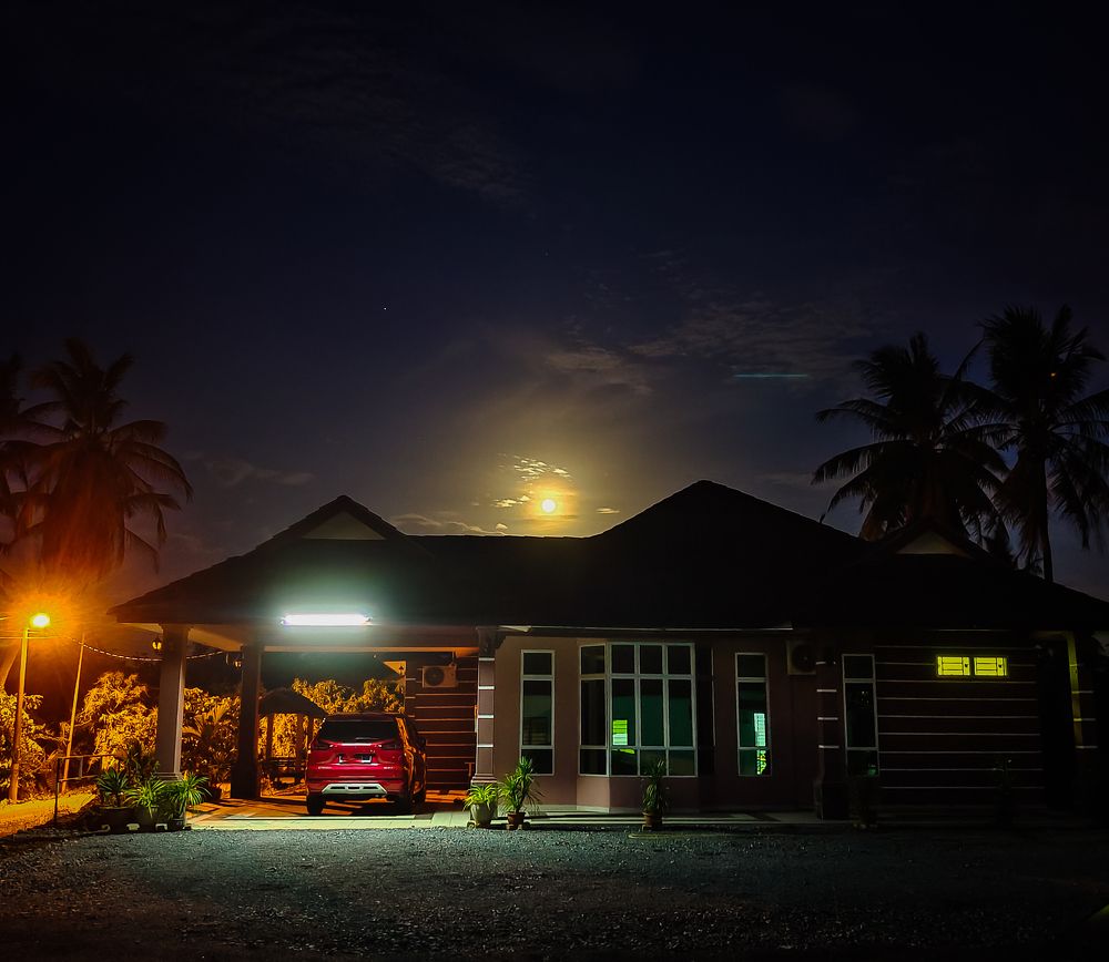Neighbor house and moonlight