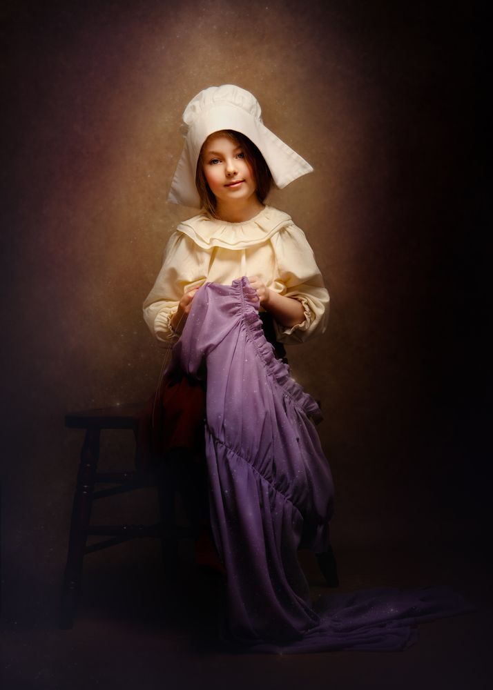 Золушка за шитьем