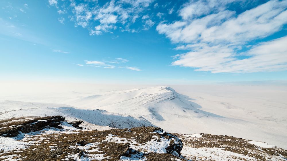 На вершине.