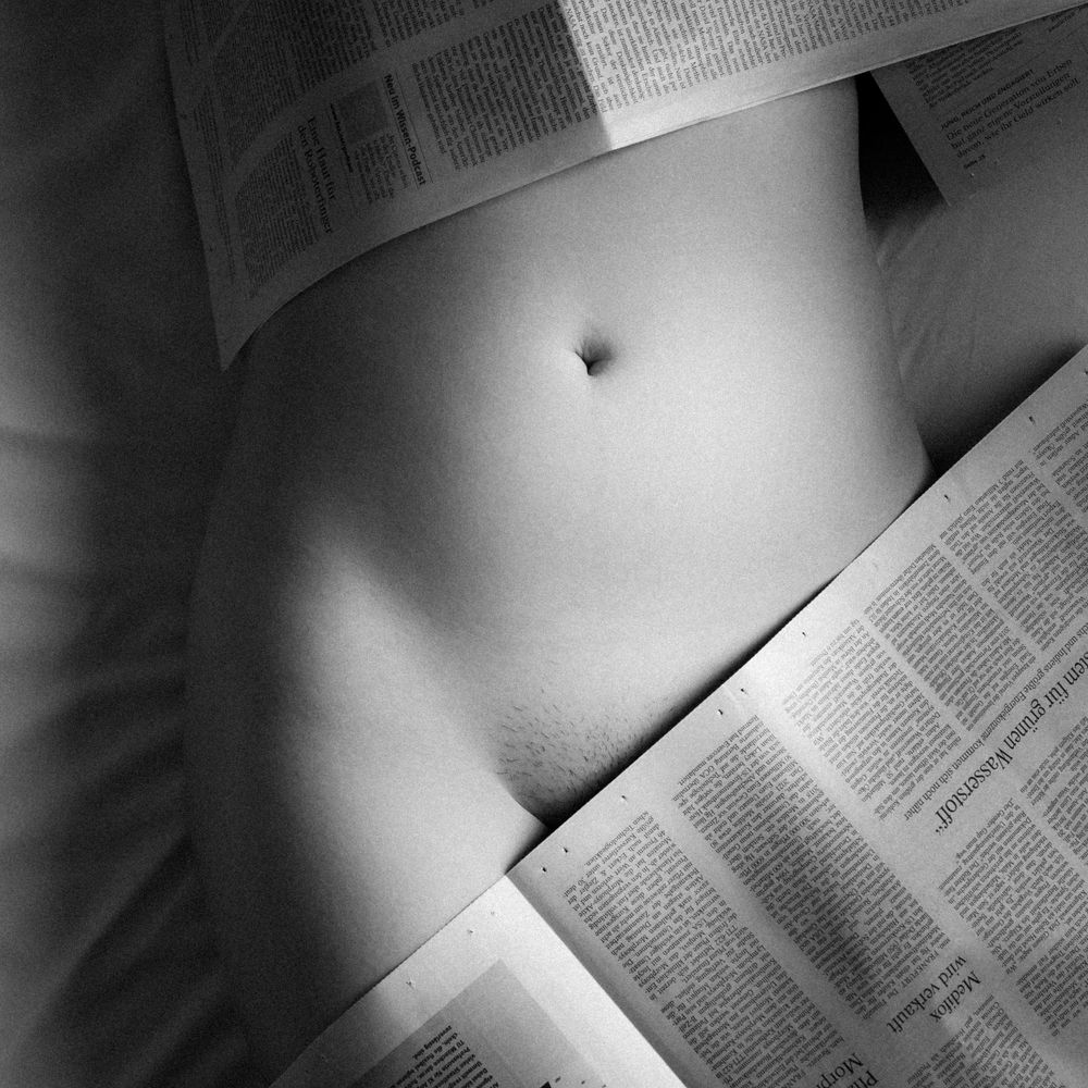 Woman reading newspaper