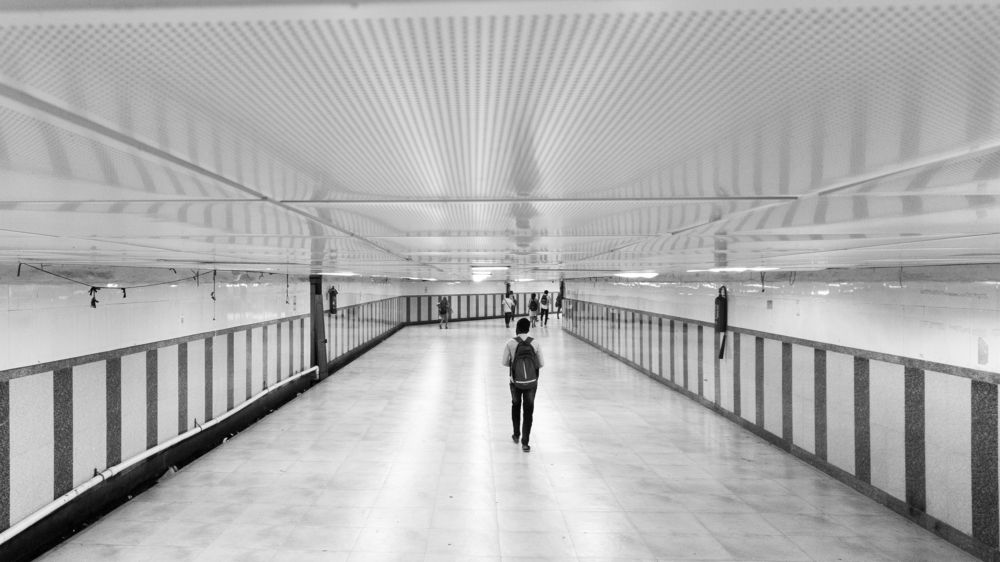 A photo walking alone at subway