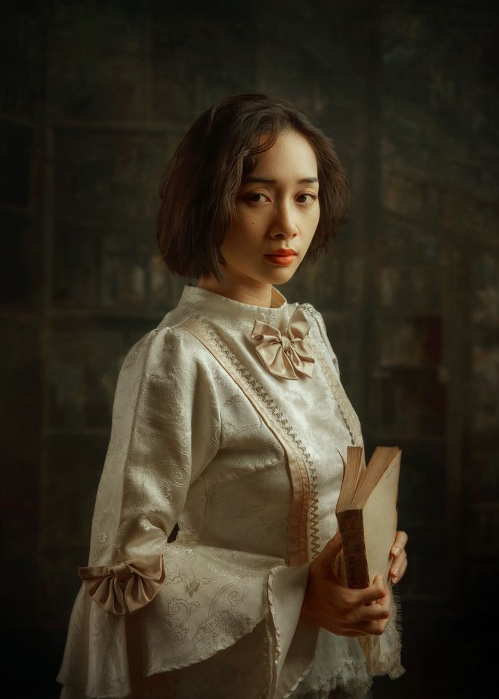 Girl with an old book