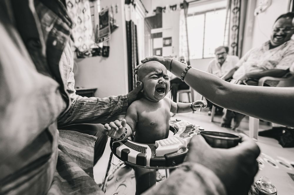The ritual of cutting the hair.