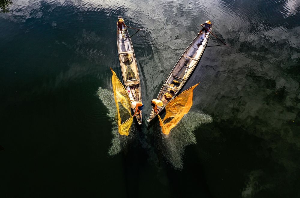 Casting a fishing in Nhu Y rive - Viet Nam