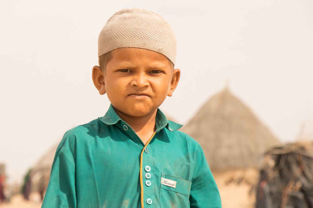 Face Full of sand, eyes full of hope