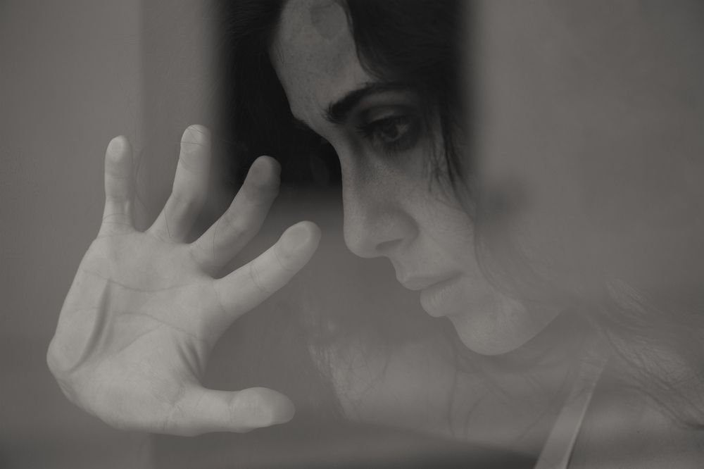 Francesca behind the window