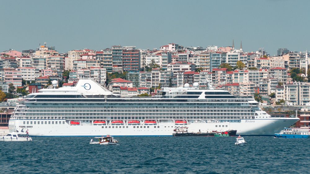 Istanbul, cruise ship smoothly into the cityscape