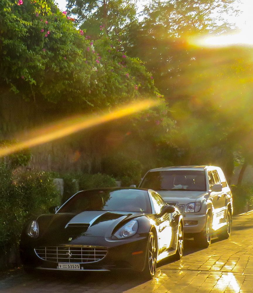 Luxury car in the rays of the sun
