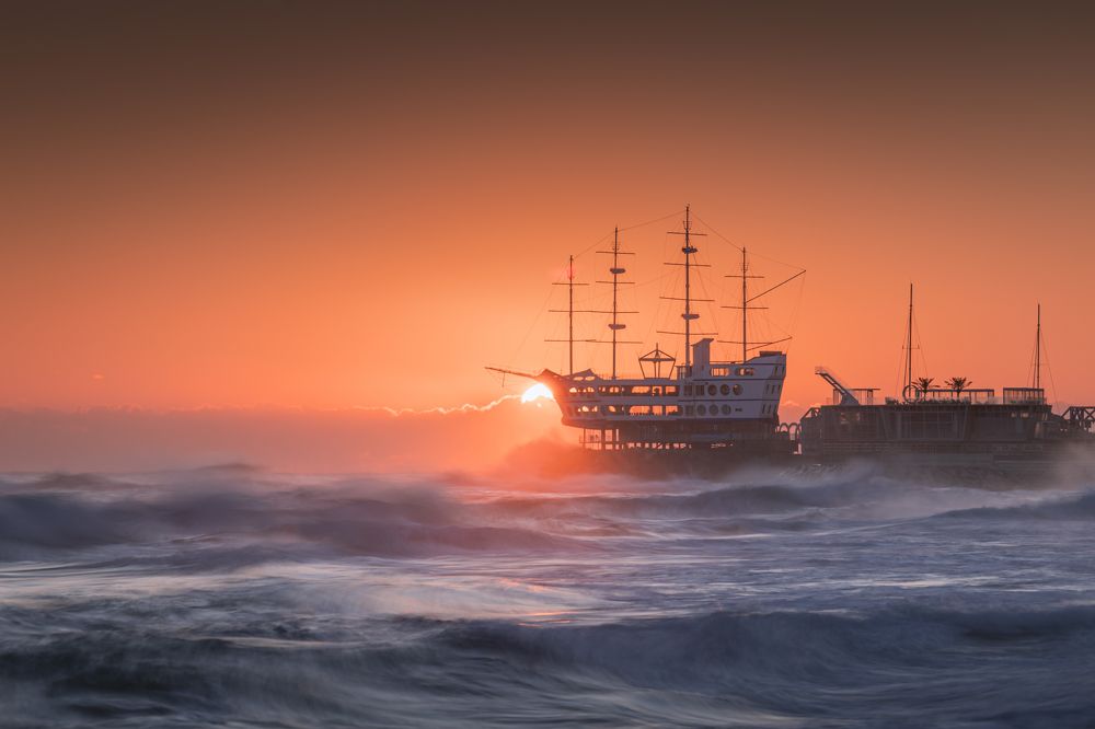 Sunrise on the bow of the boat