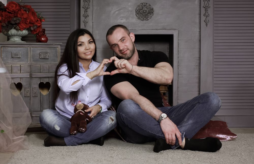Kunduz with her husband in an interior loft studio