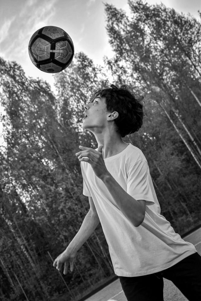 Играющий с мячом.