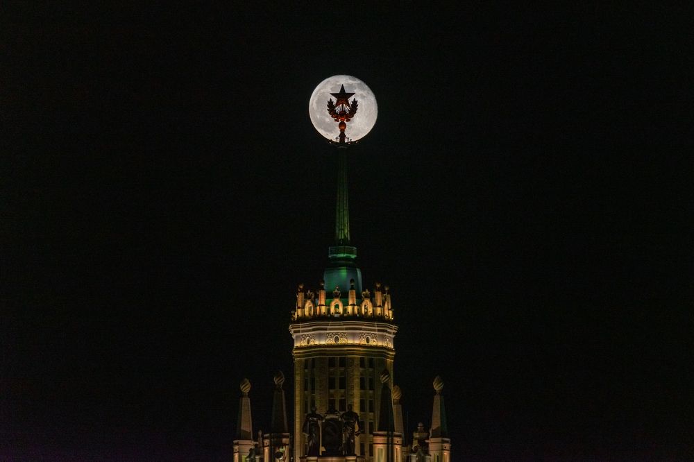 Full Moon through the Star of Stalin's Skyscraper