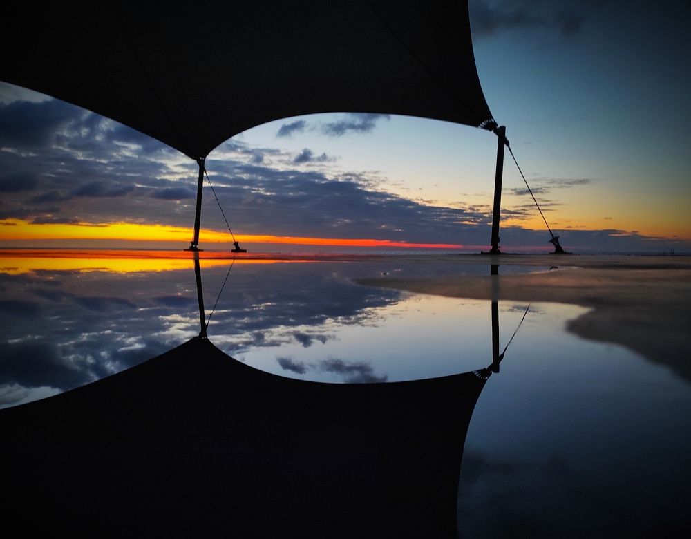 Reflection Of Sunset