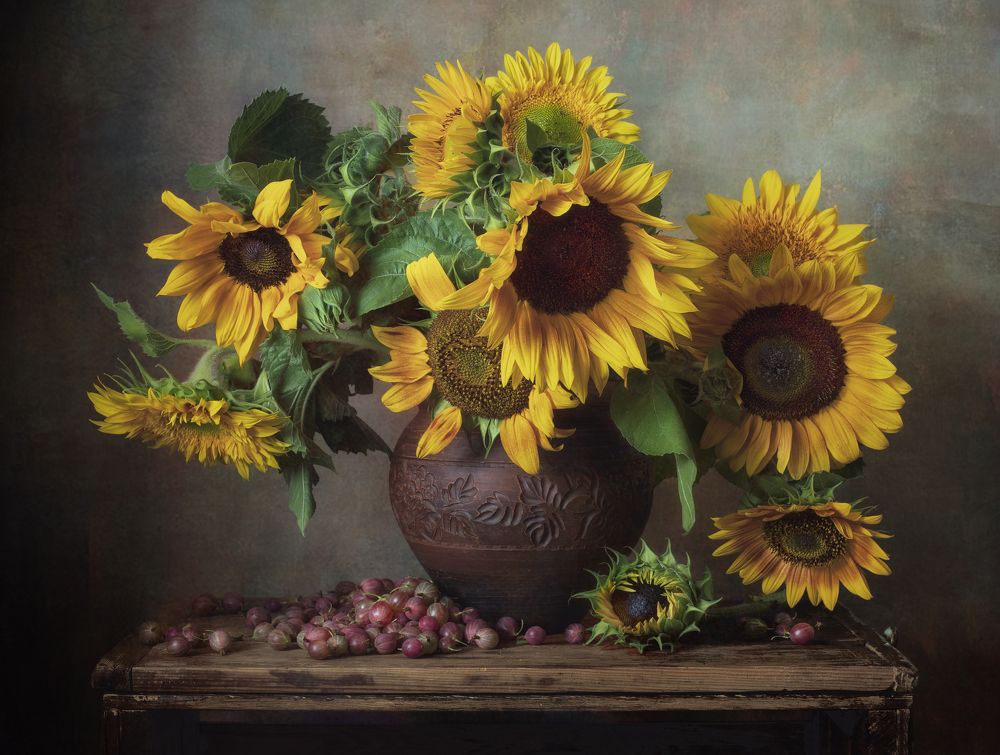 Still life with sunflowers and gooseberries