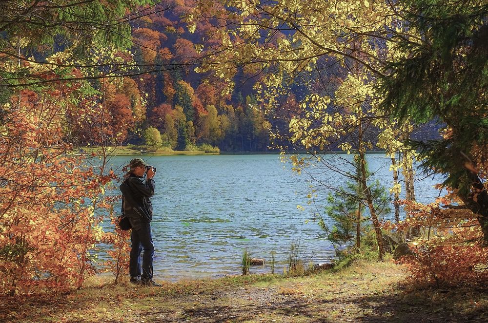 Photographer on the shores of Lake St. Anne