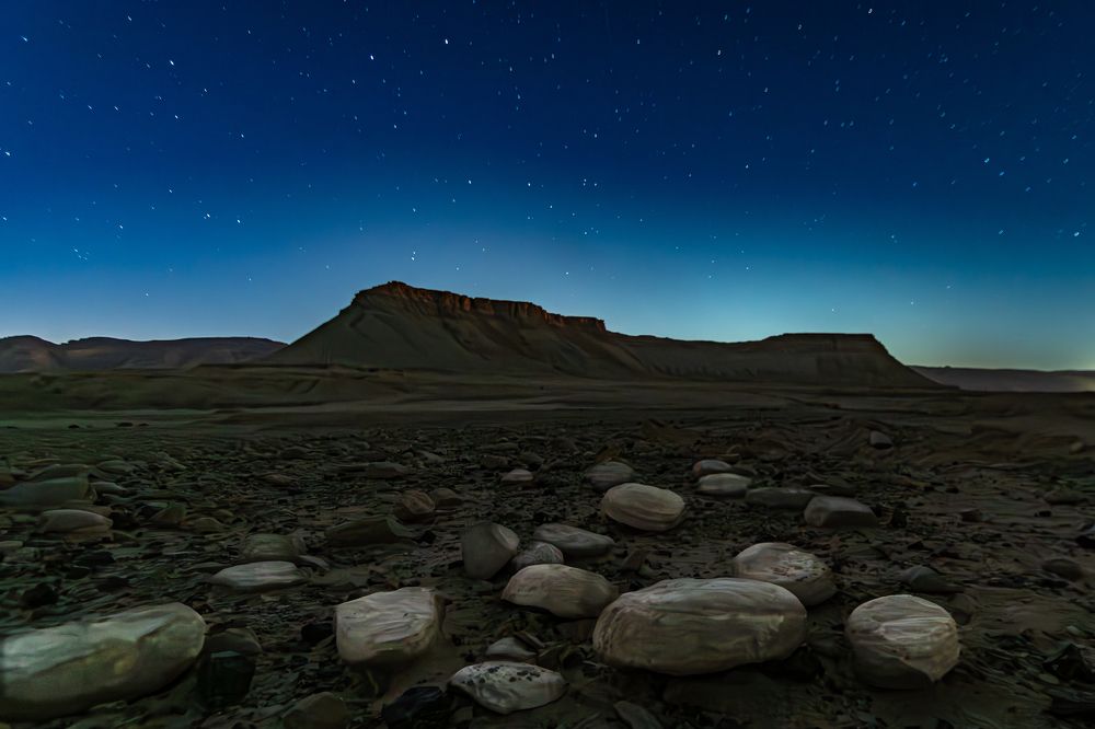 Bulbus rocks field at starry sky