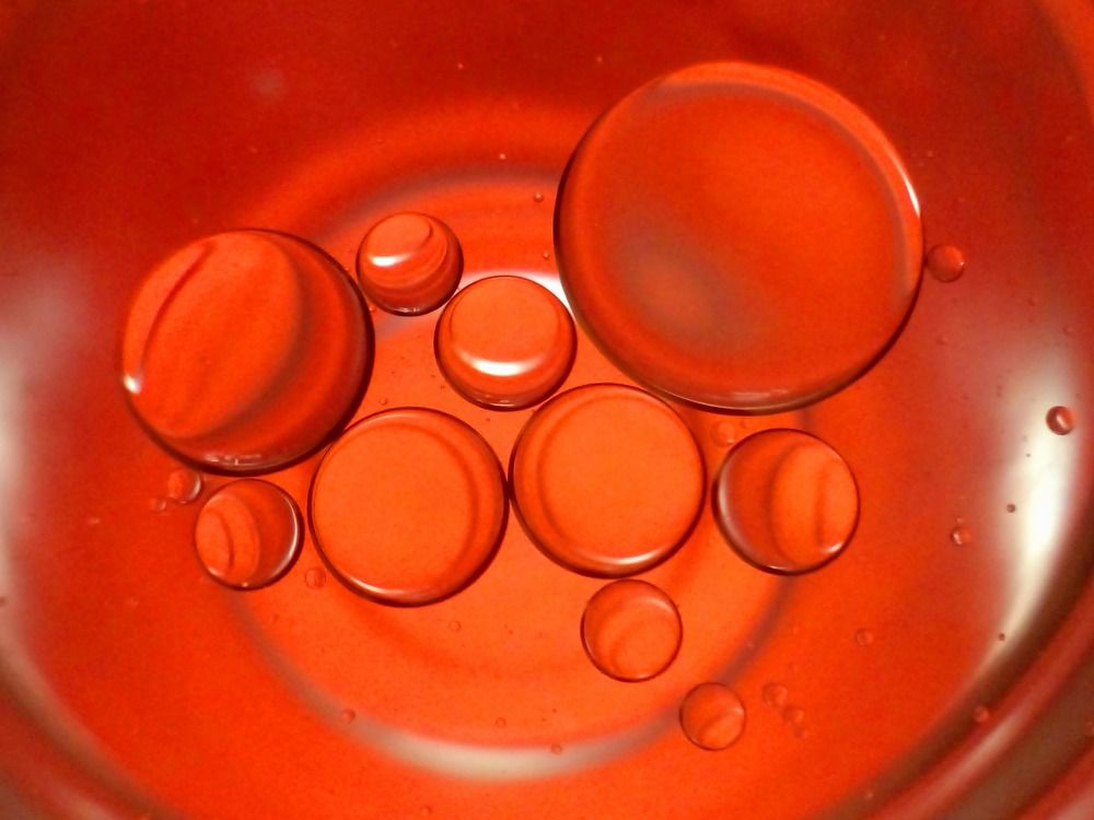 Orange oil bubbles.