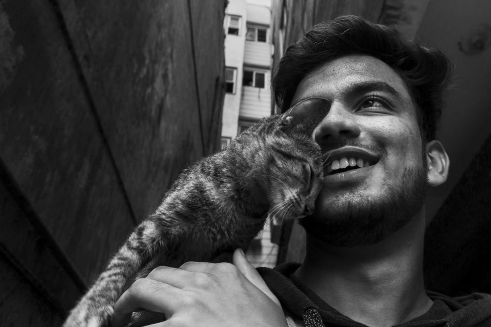 A Boy, a Cat, and a Timeless Bond"