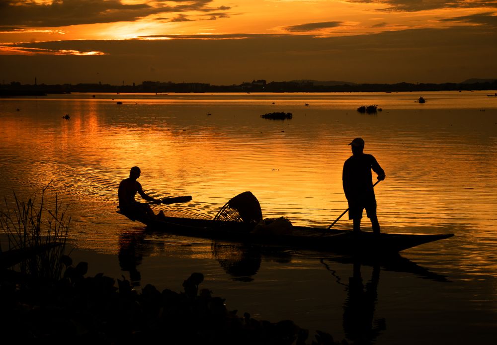 Sunset and the fishermen