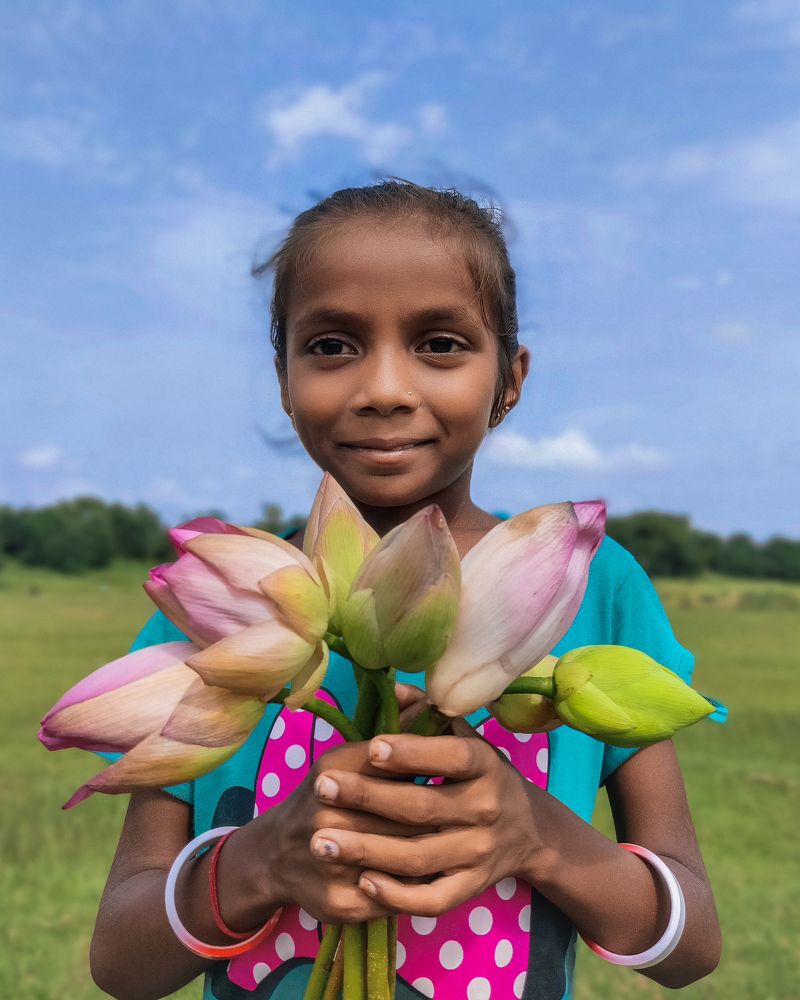 Blossoms in Her Hands