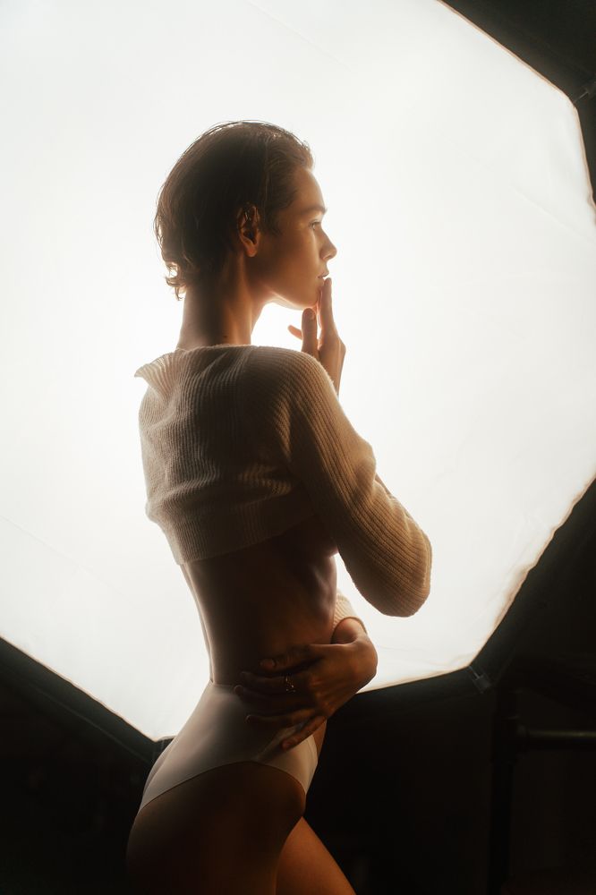 Illuminated Silhouettes: A Study in Low-Key Sensuality