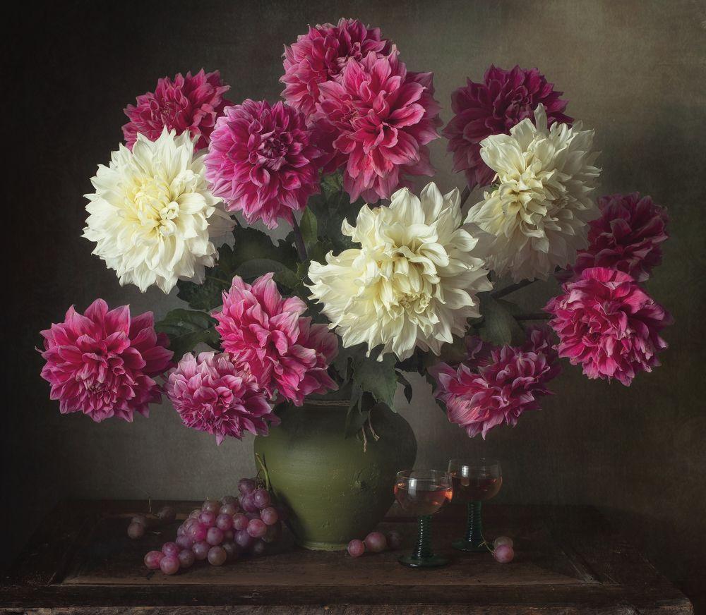 Still life with flowers and grapes