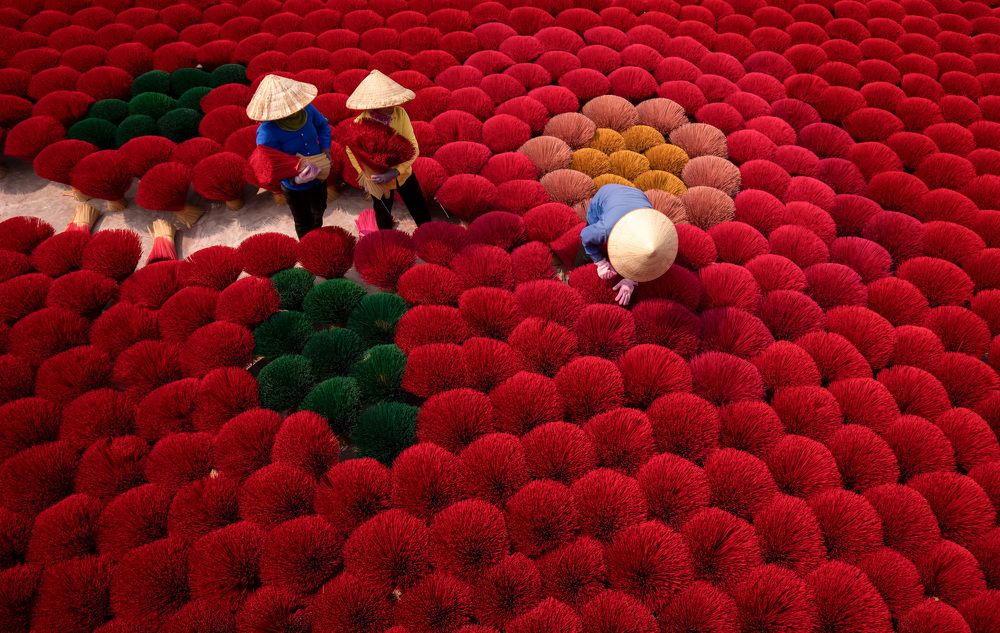 Women work hard at making incense