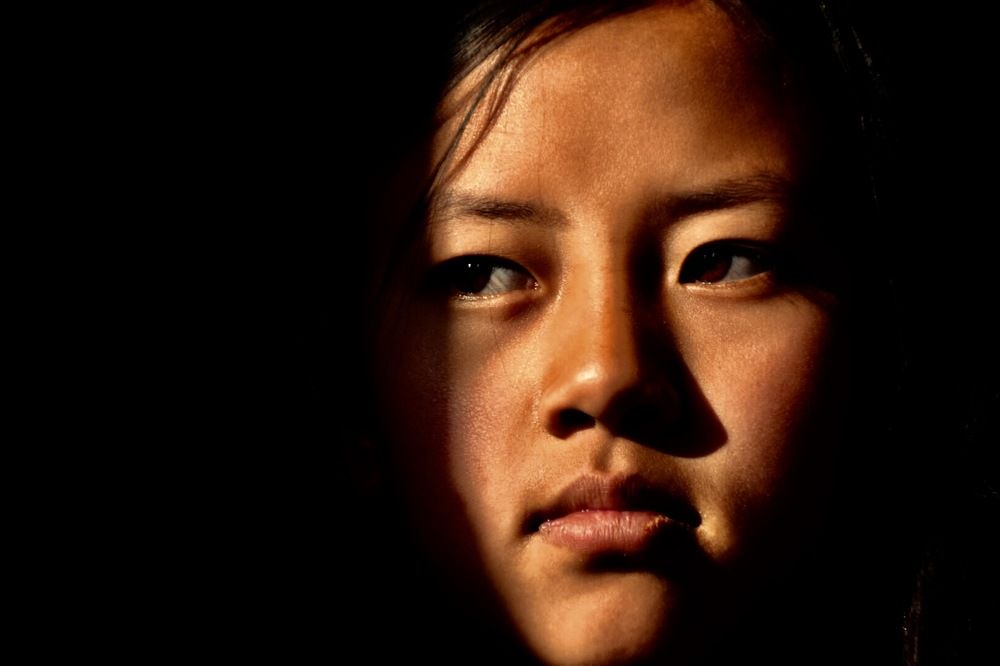 Face that discovers inner darkness and hope