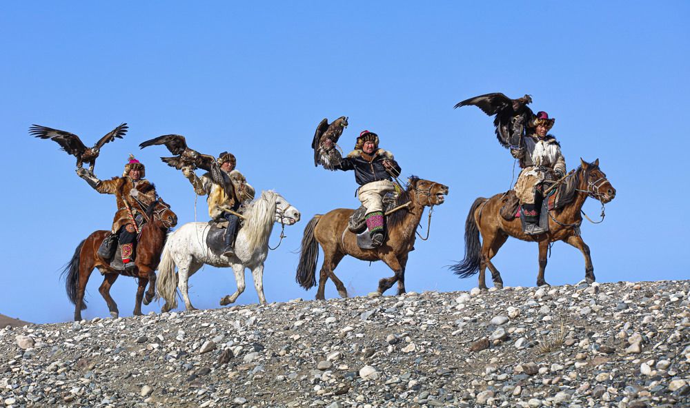 Four eagle hunters