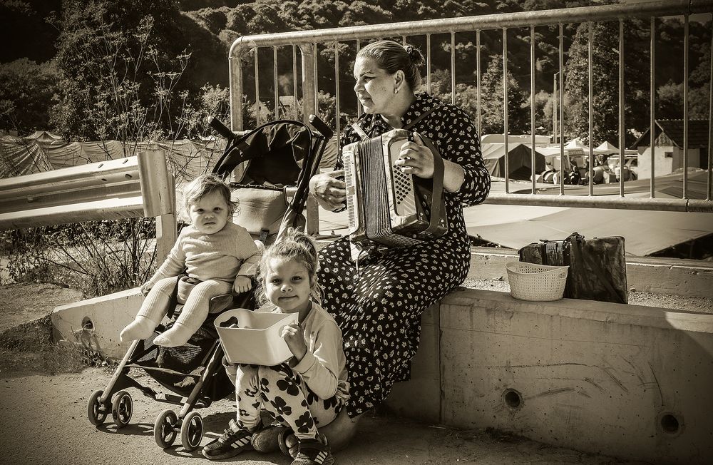 Musician woman with her little ones