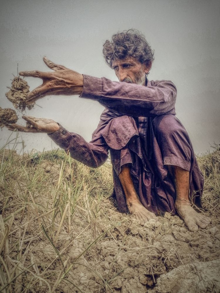 Farmer working on earth