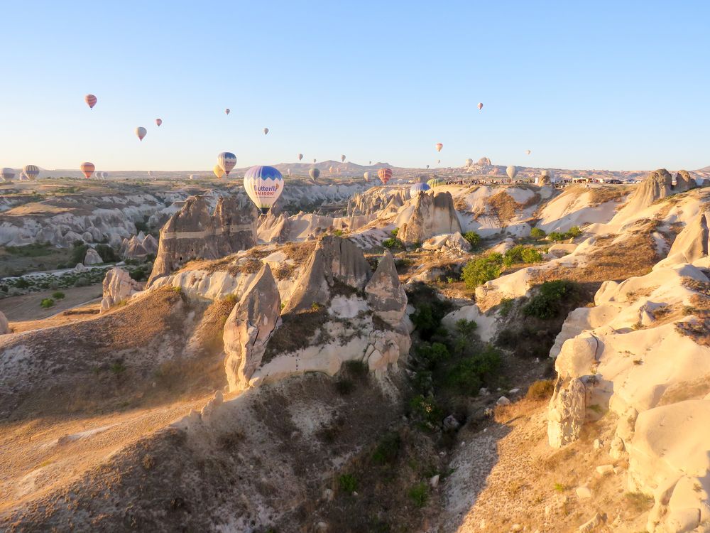 Unusual landscape of Cappadocia and hot air balloons