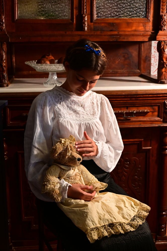 Girl with a teddy bear