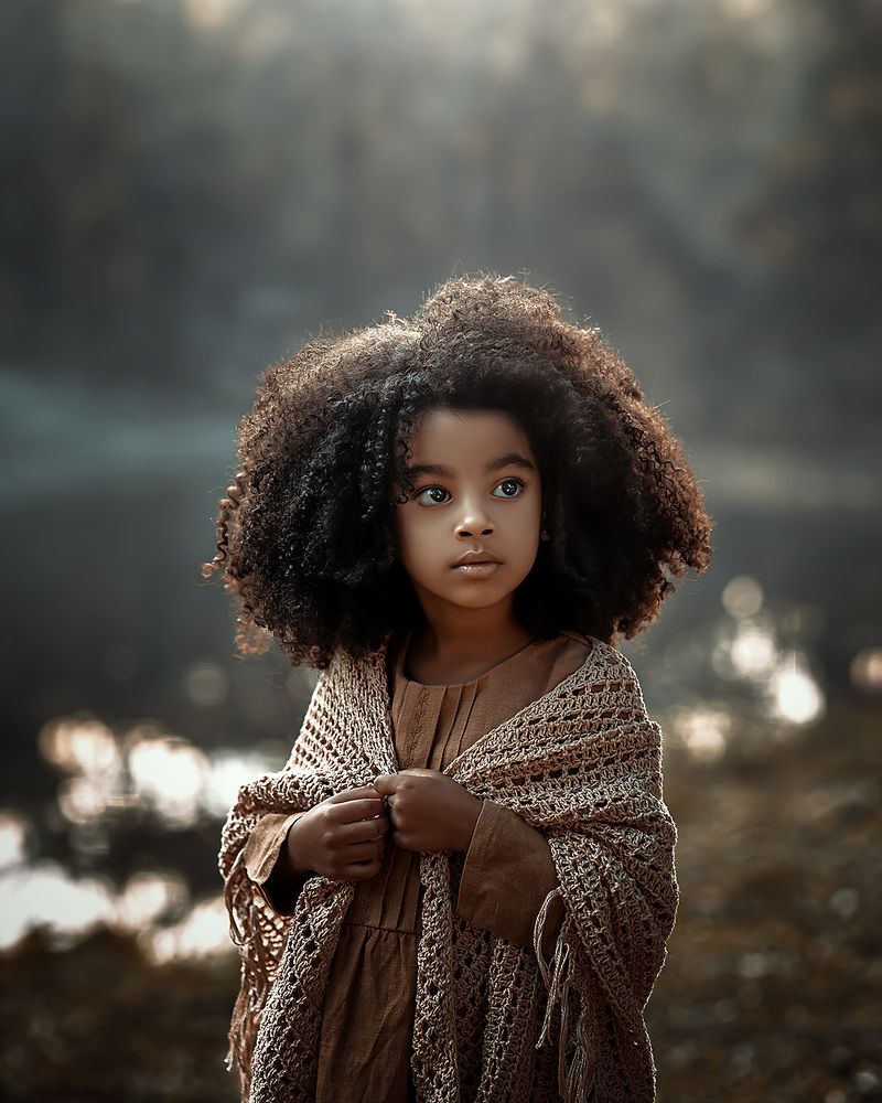 Cute girl with curly hair