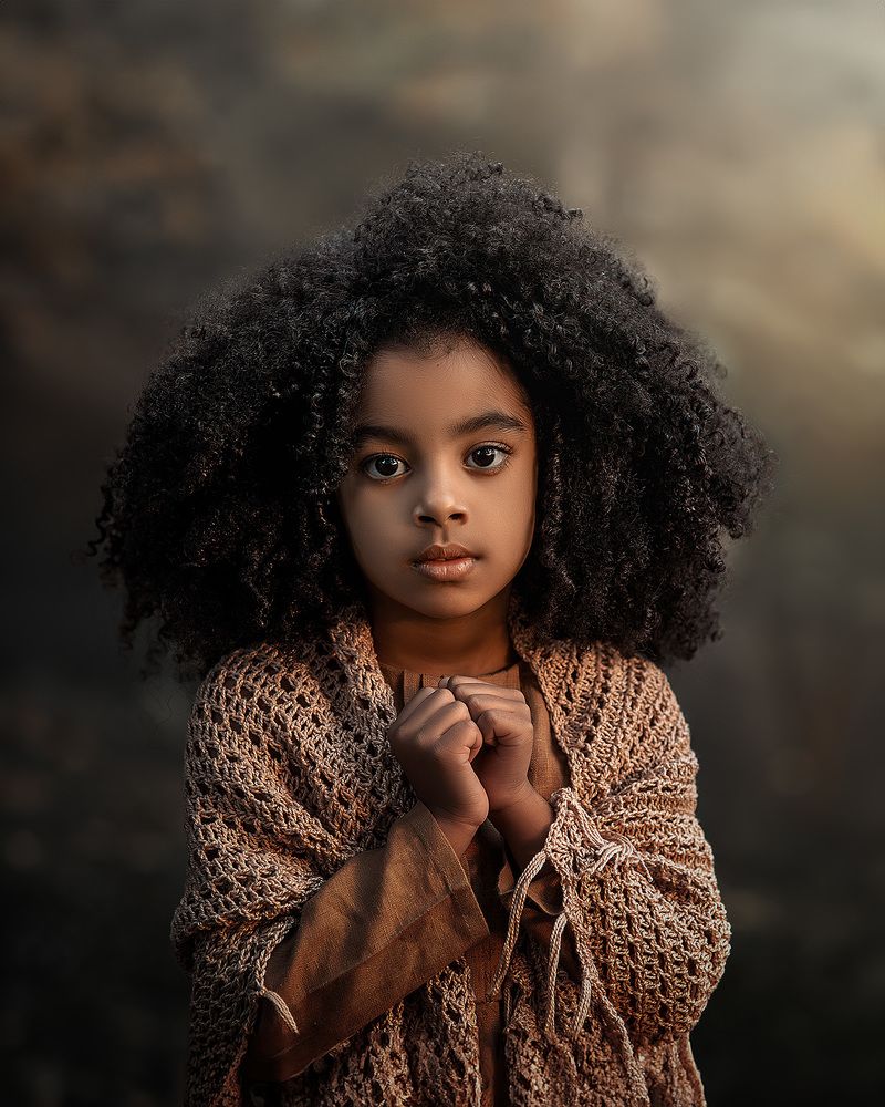 Cute girl with curly hair