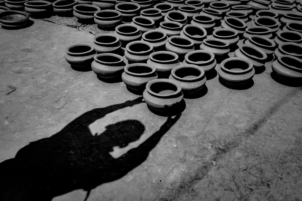 Human Shadow and Pottery