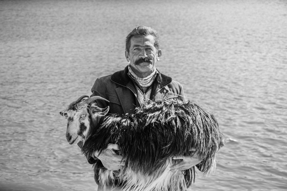 Nomadic Symphony: A Portrait by the Tranquil Lake