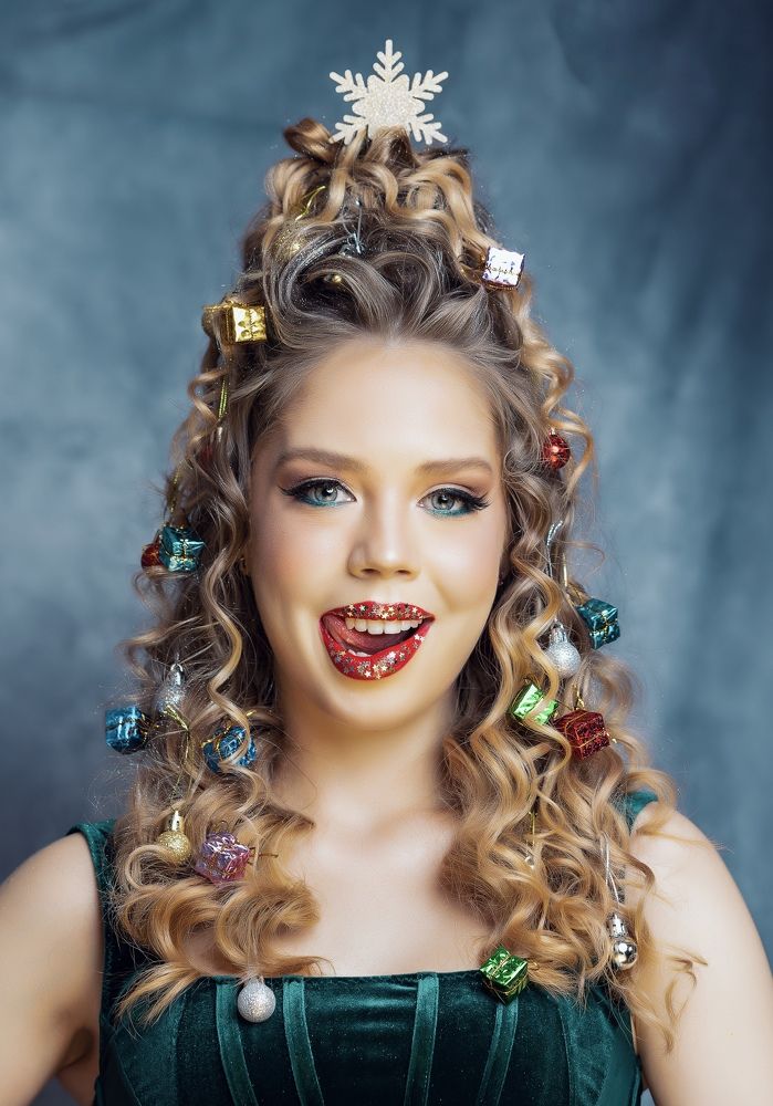 Beauty girl in Christmas tree