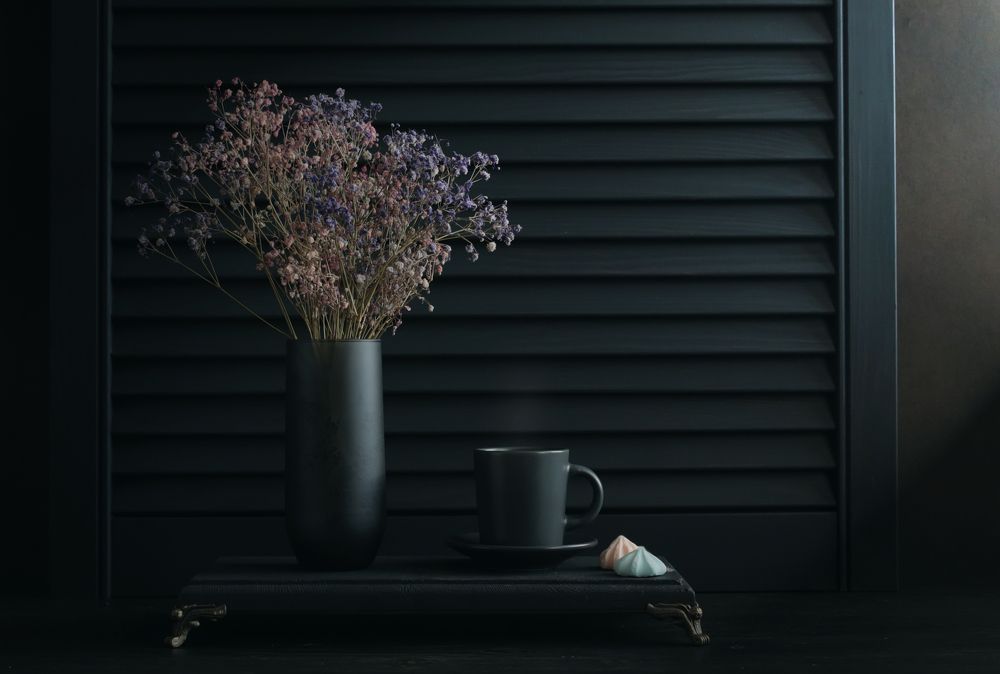 Cup of coffee on black