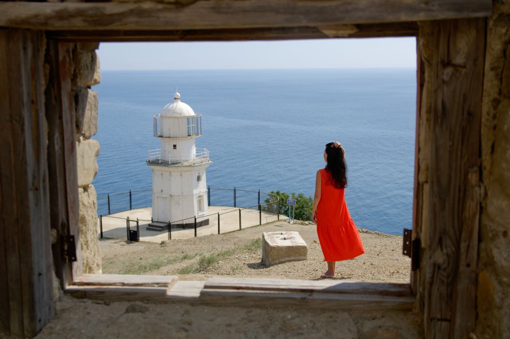 Взгляд на маяк на мысе Меганом