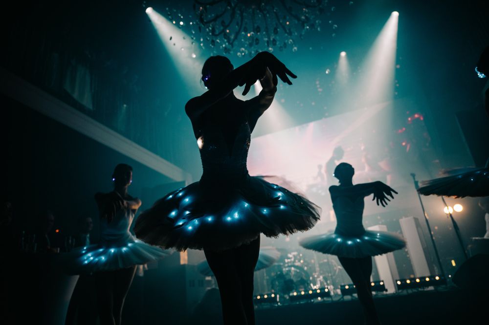 Swan at a corporate party.