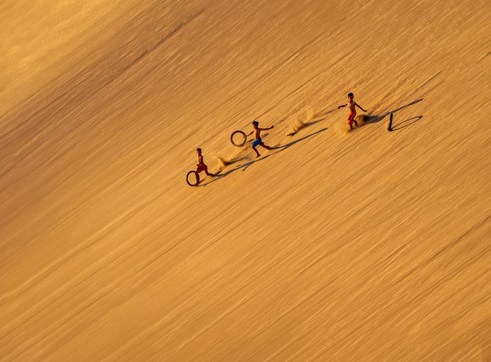 Racing down the sand dune