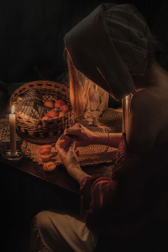 Young cook and apricots for the master