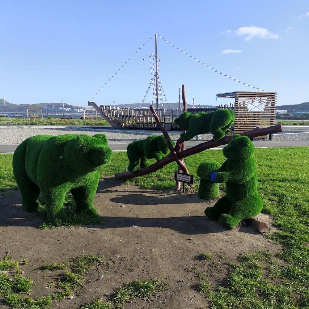 Медведица с медвежонками