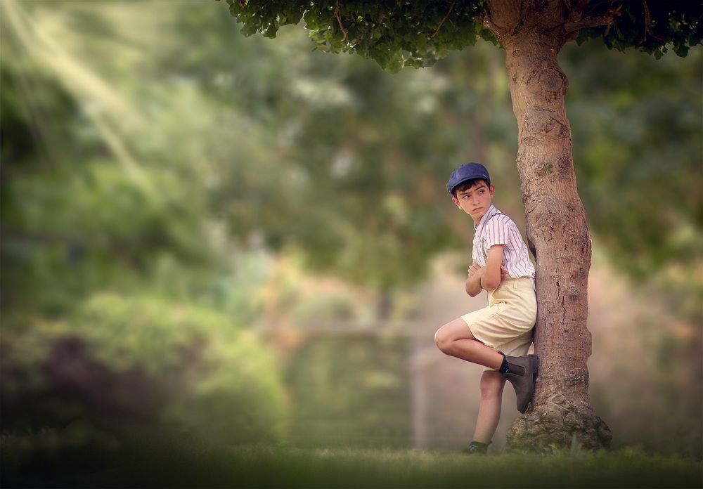 A boy is waiting for his friends