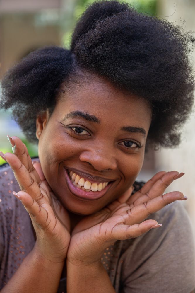 A young woman smiling in a portrait photo.